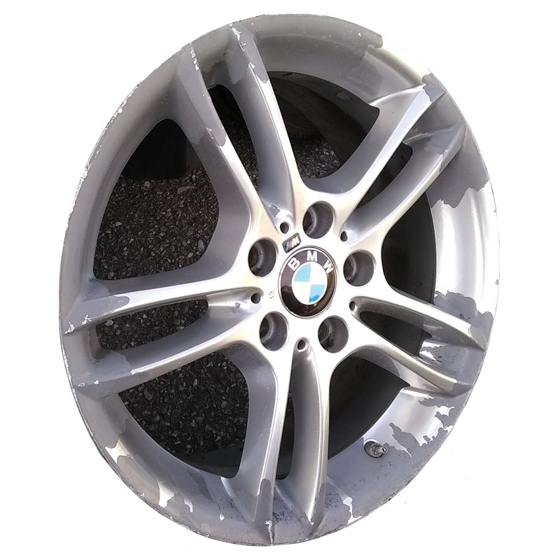 Finish failure and corrosion example on BMW wheel